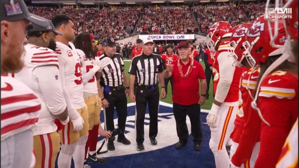 Members of Lāhaināluna football team join field as honorary captains