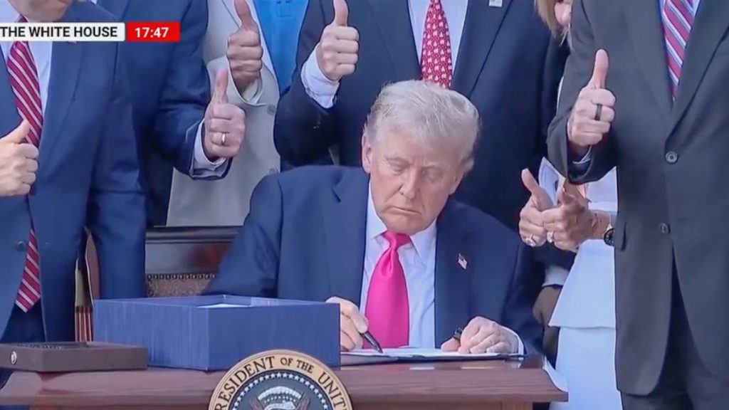 President Donald Trump signs One Big Beautiful BIll Act on July 4. (Screen shot video of signing)
