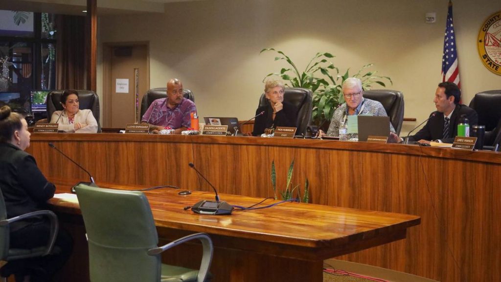 Hawaiʻi County Police Commissioners Wendy Botelho, Lloyd K. Enriquez, Eileen Lacerte, Rick Robinson and Corporation Counsel attorney Sinclair Salas-Ferguson discuss logistics of hiring the next police chief during a police commission meeting on Dec. 19, 2025. (Kelsey Walling/Big Island Now)