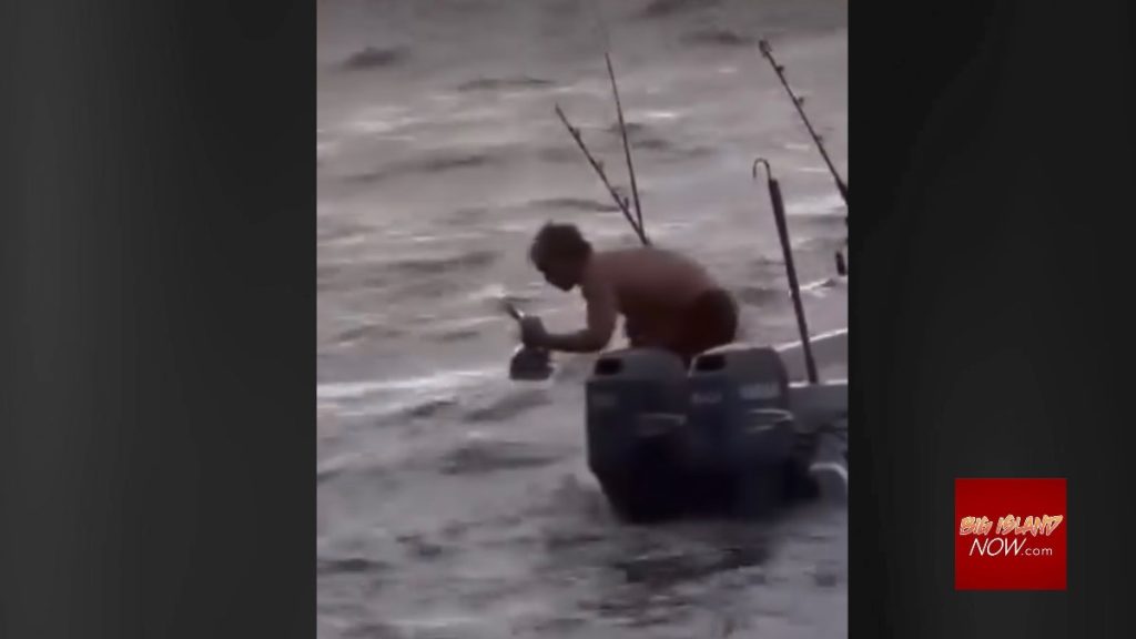 Jake Baker was shown on a video jumping off a boat and into the water with a bong and marijuana in a quest to make it to shore. (Screenshot)