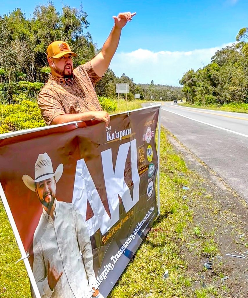 Zed Ka‘apana Aki sign-waving for District 6 Hawai‘i County Council race primary election in July 2026. (Photo courtesy: Zed Ka‘apana Aki)