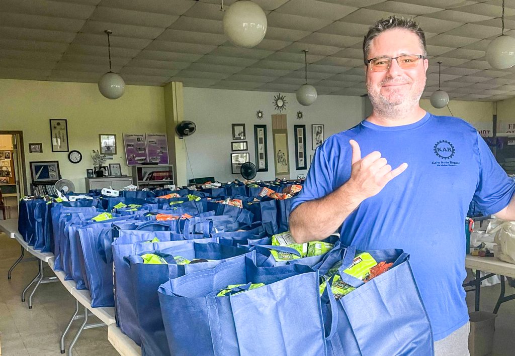 Jason Masters volunteering at the Nā‘ālehu Resilience Hub for Vibrant Hawai‘i's Kaukau for Keiki. (Photo courtesy: Jason Masters)