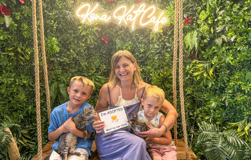 Andrea Walker with her sons Walker, 7, and Westley, 4, after adopting two kittens from the Kona Kat Café. (Photo courtesy: Andrea Walker)