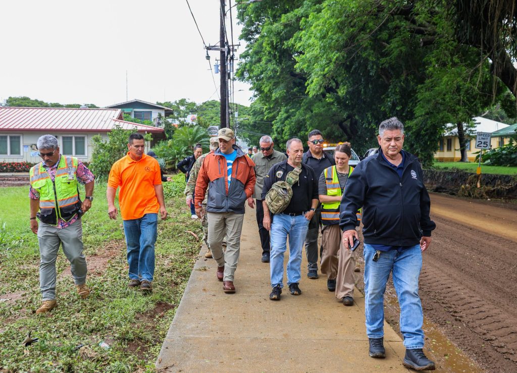Hawaiʻi Gov. Josh Green, Hawaiʻi County Mayor Kimo Alameda and other government officials walked through Nāʻālehu on Aug. 17, 2026, two days after Hurricane Lala struck the small town in the southern part of the Big Island. (Photo Credit: Office of the Governor)
