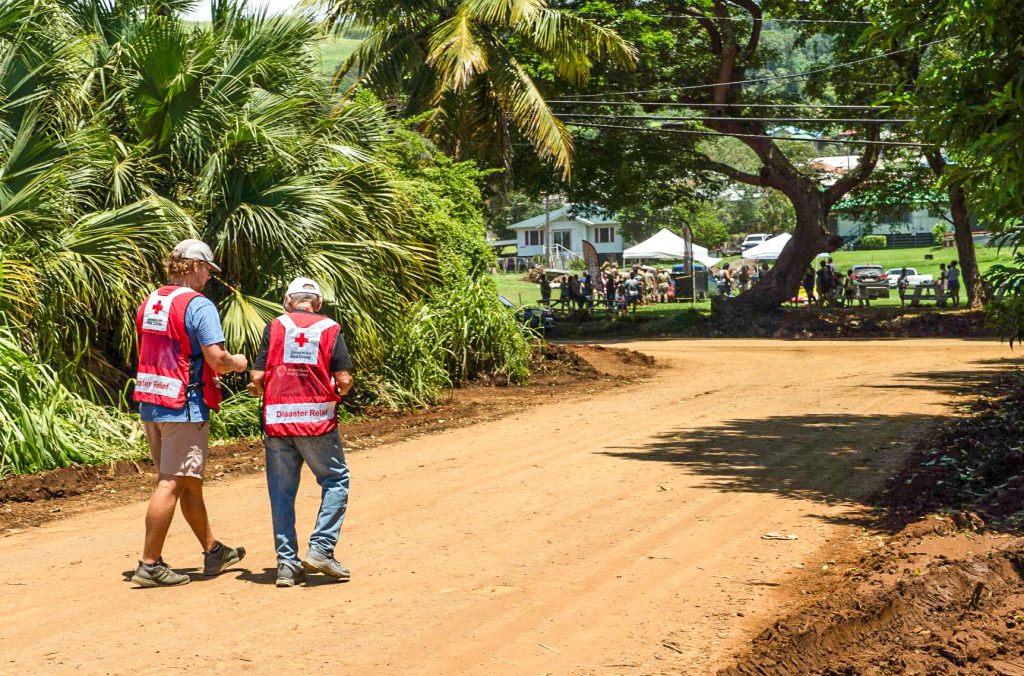 American Red Cross workers leaving Niu Street in Nā‘ālehu on Aug. 19, 2026, after reviewing damage of properties hit by Hurricane Lala. (Tiffany DeMasters/Big Island Now)