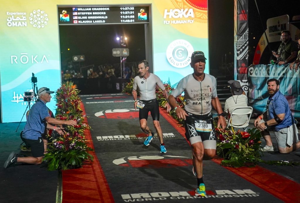 Steffen Brocks of Kailua-Kona crosses the finish line at the Ironman World Championship in Kona on Oct. 10, 2026. (Tiffany DeMasters/Big Island Now)