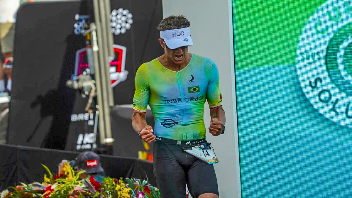 José Graca of Kailua-Kona crosses the finish line at the Ironman World Championship in Kona on Oct. 10, 2026. (Tiffany DeMasters/Big Island Now)