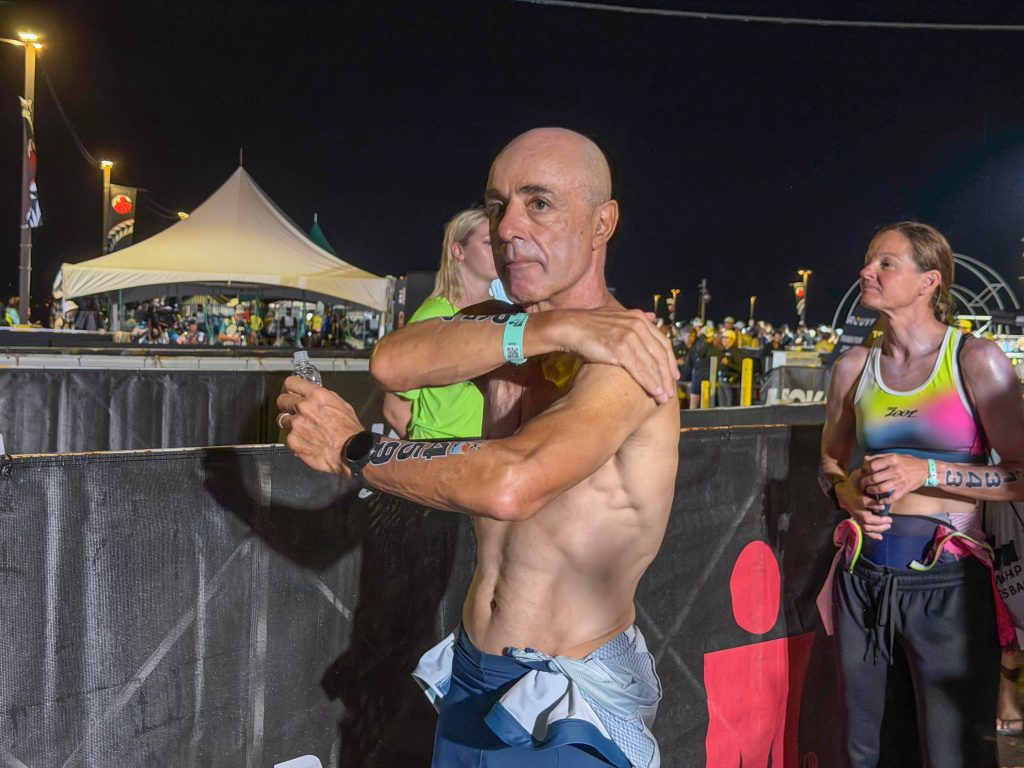 Ironman triathletes prepare before the start of the World Championship in Kailua-Kona on Oct. 10, 2026. (Tiffany DeMasters/Big Island Now)