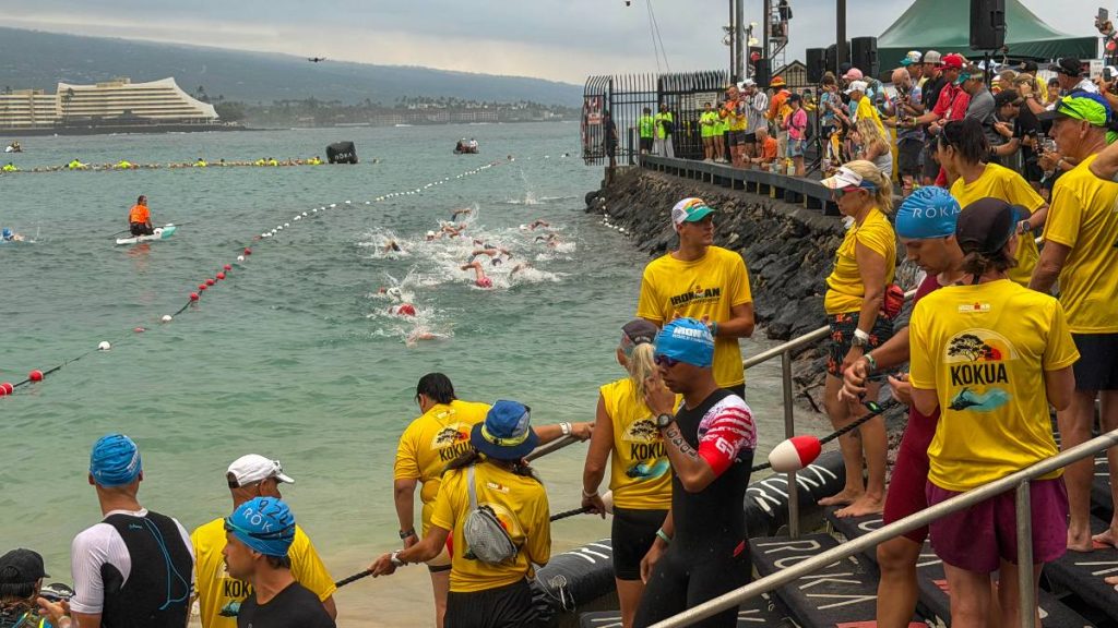 The pro men complete the 2.4-mile swim in Kailua Bay, the first leg of the Ironman World Championship in Kailua-Kona on Oct. 10, 2026. (Tiffany DeMasters/Big Island Now)
